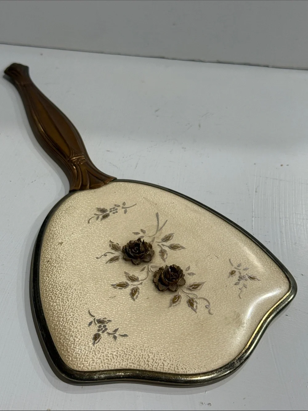 Mid Century Hollywood Regency Hand Held Mirror with Floral Detail 1950’s